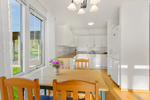Dining area with room for a table under the window.